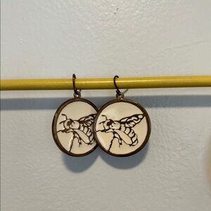 Cream and Brown Circular Earrings with Hand Design